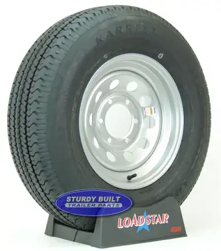 ST225/75R15 Radial Trailer Tire on a Silver Gray Mod 6 bolt Wheel
