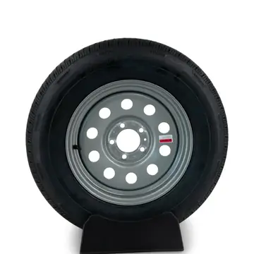 Rainier ST205/75R15 Radial Trailer Tire on a 5 Bolt Silver Modular Painted Wheel